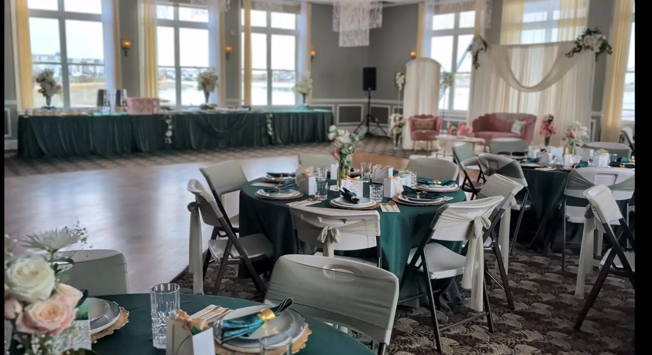 The hall set with round tables for a reception